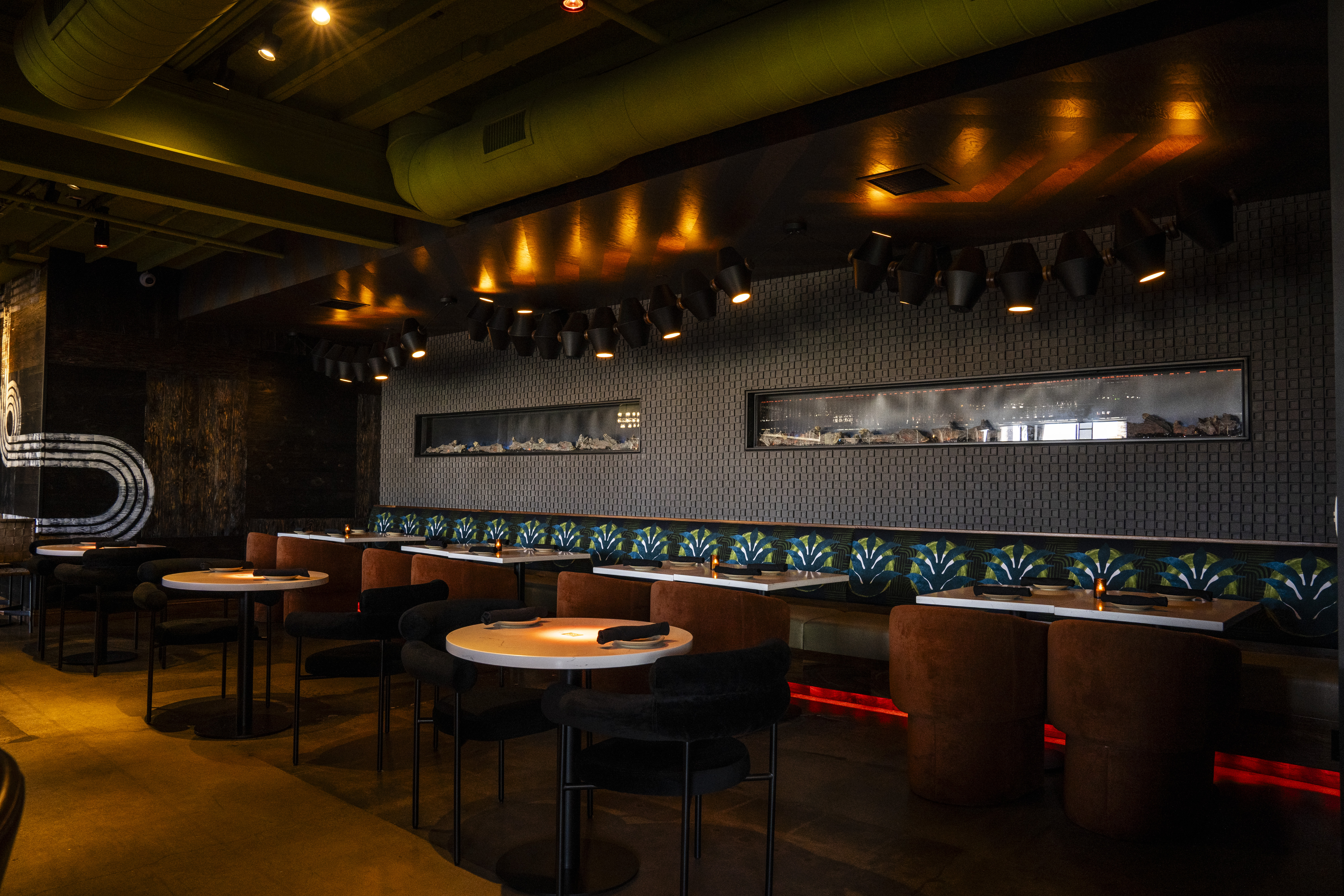 a kitchen with a table in a restaurant