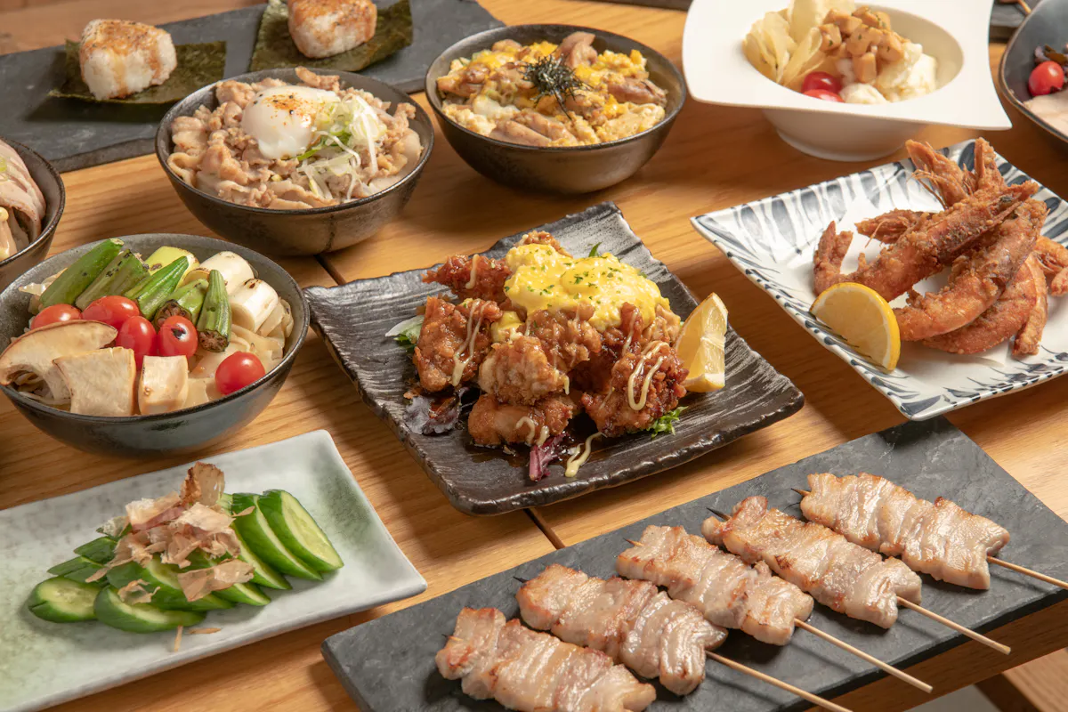 a bunch of food sitting on top of a wooden table
