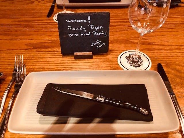 a cake sitting on top of a wooden table