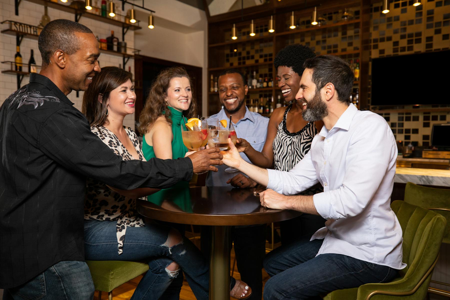 a group of people sitting at a table