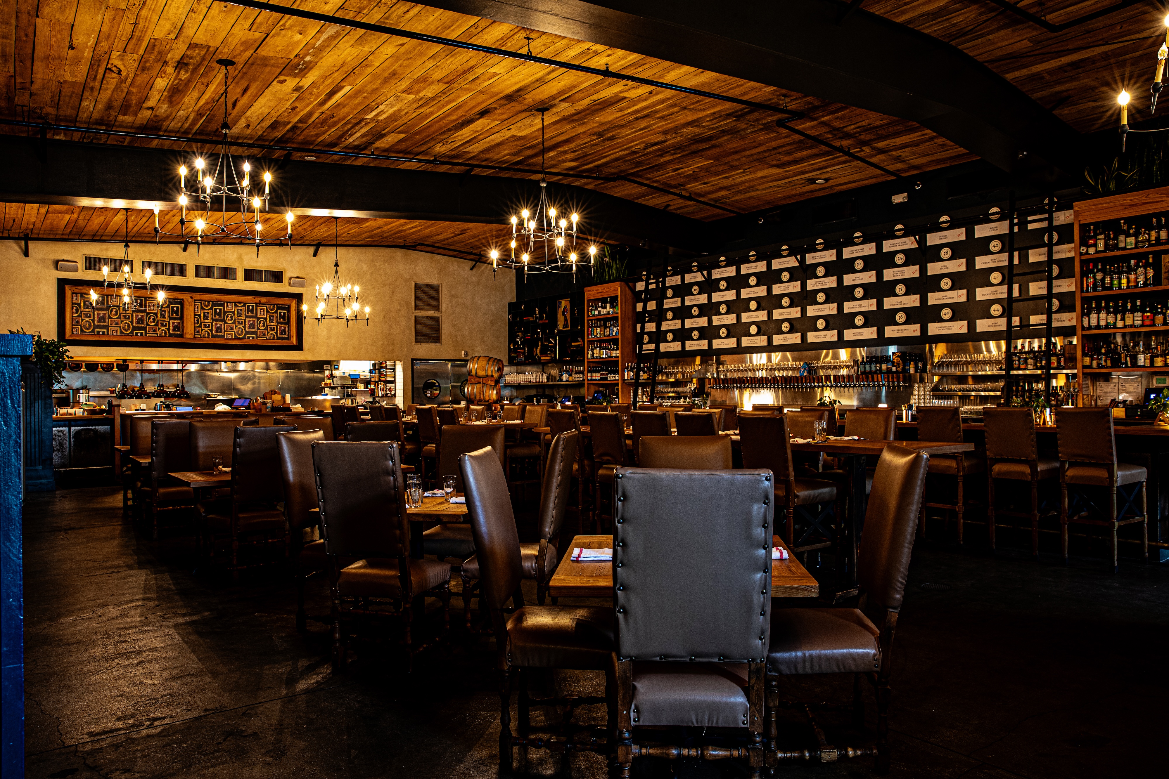 a room filled with furniture and a table in a restaurant