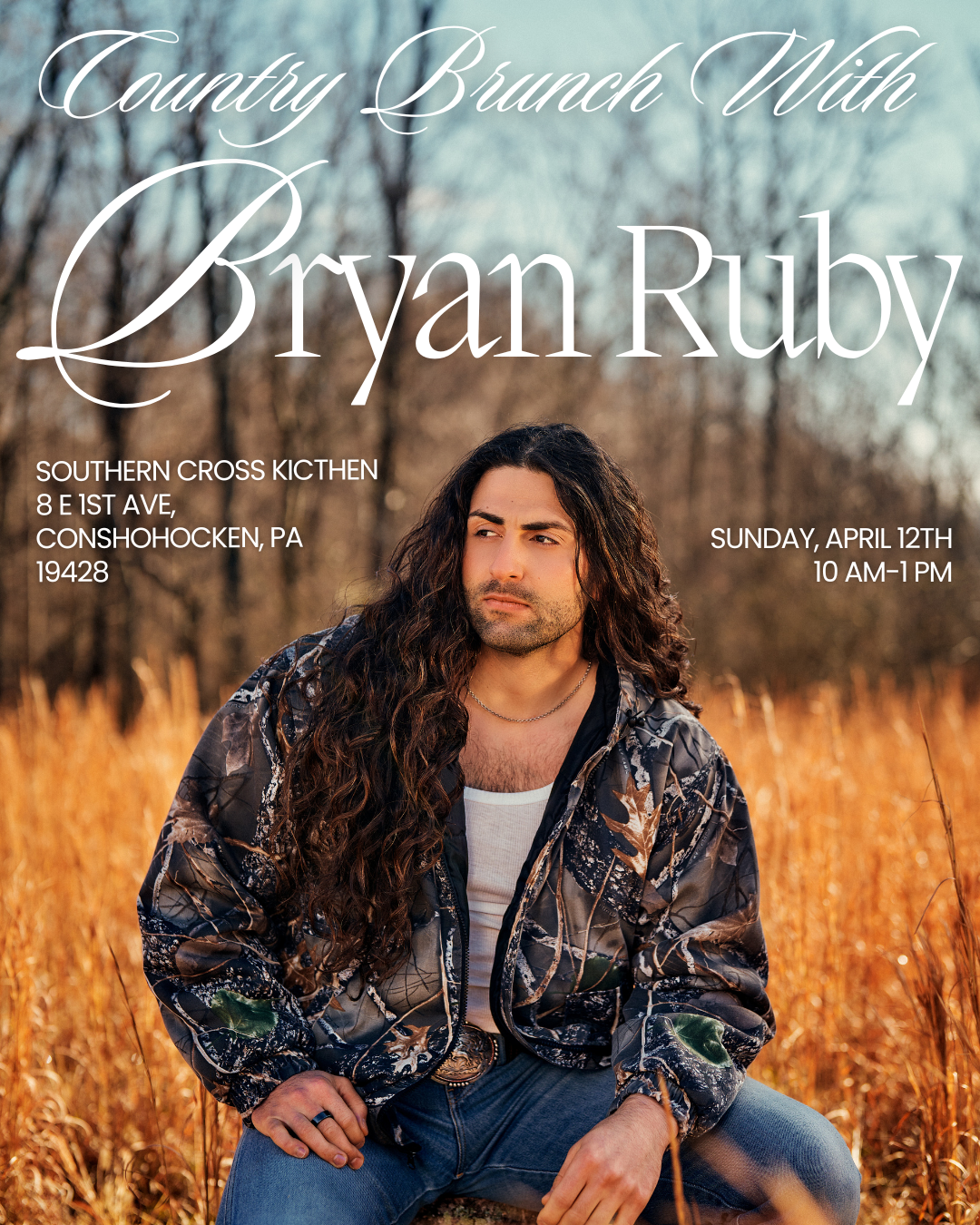 a man sitting in a field