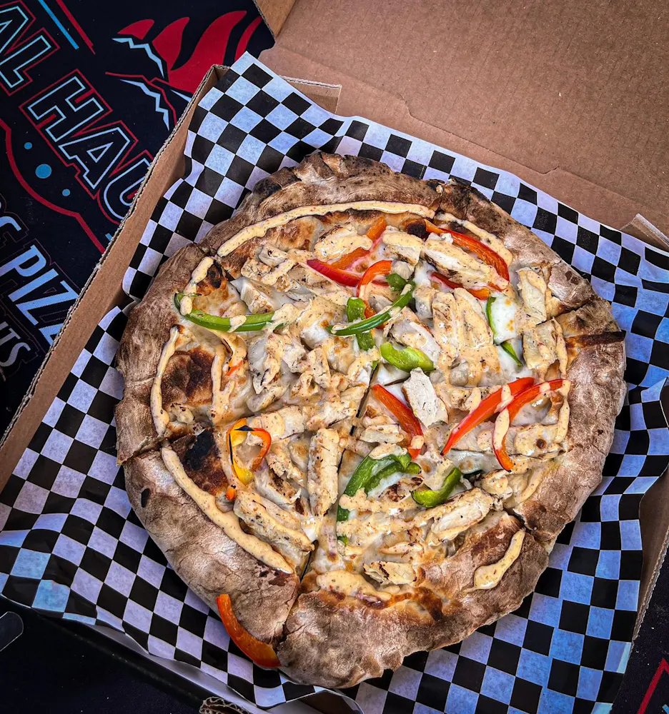 a pizza sitting on top of a table