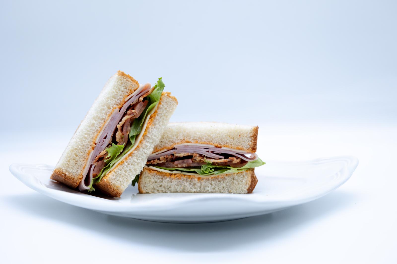 a sandwich cut in half on a plate