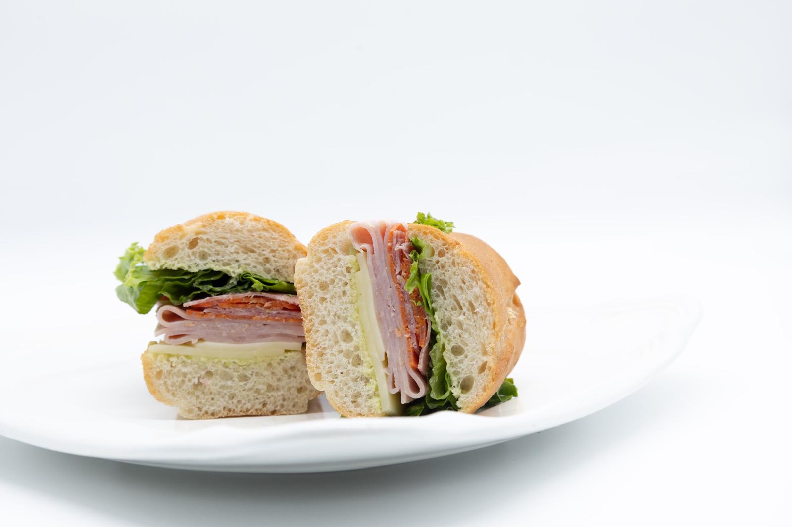 a sandwich cut in half on a plate