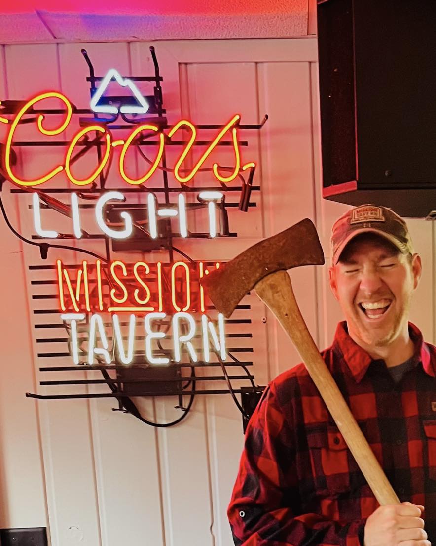 a person holding a baseball bat