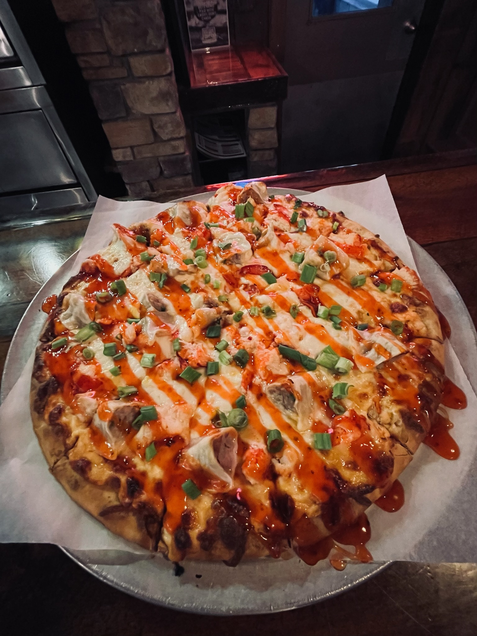 a pizza sitting on top of a table