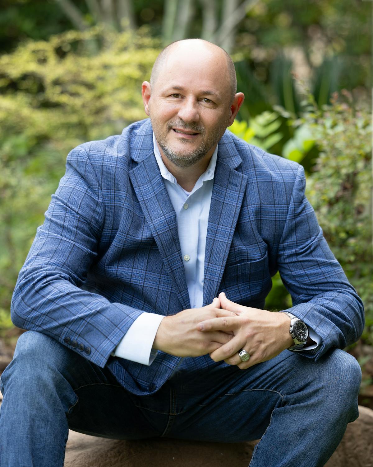 a man sitting on a bench