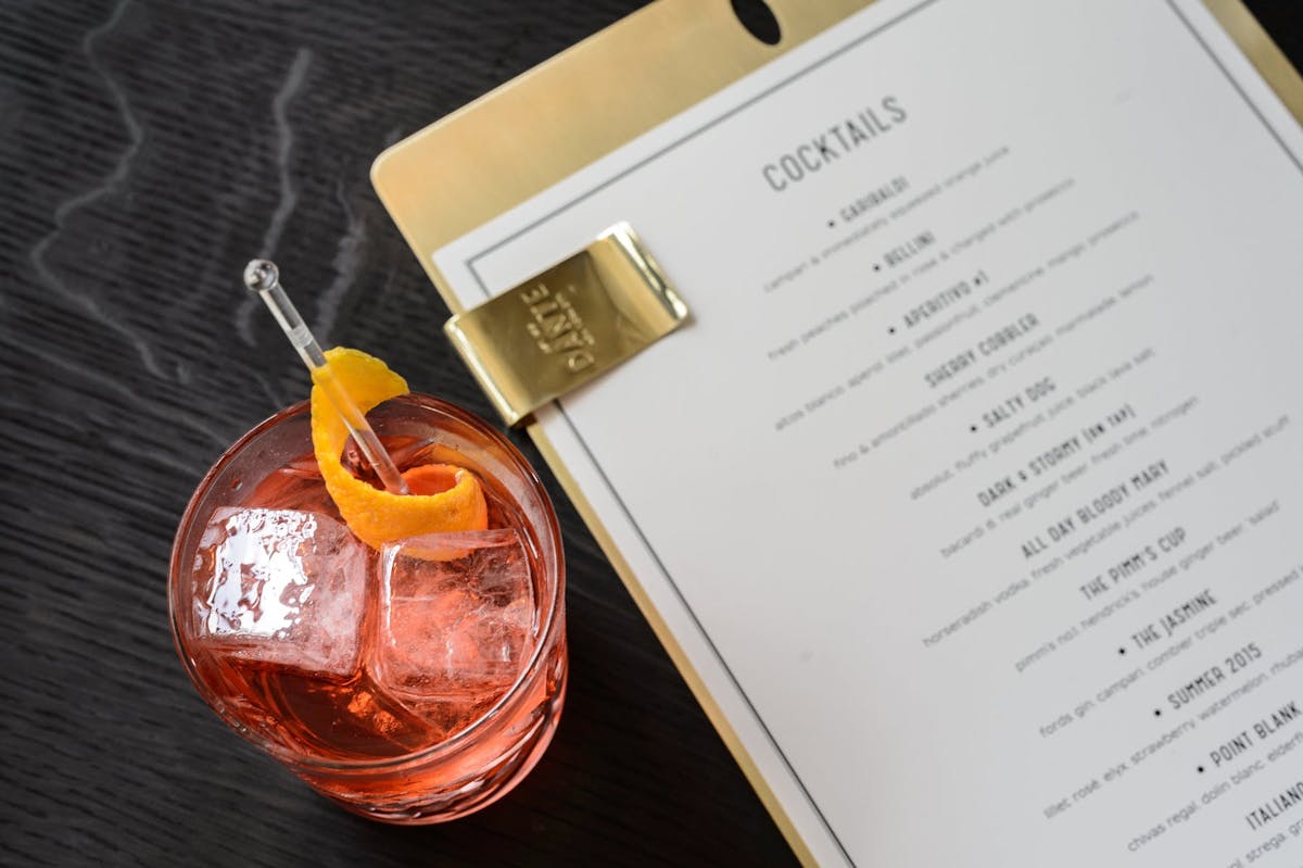 a cocktail and menu