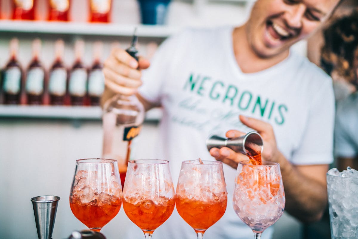 a person holding a wine glass