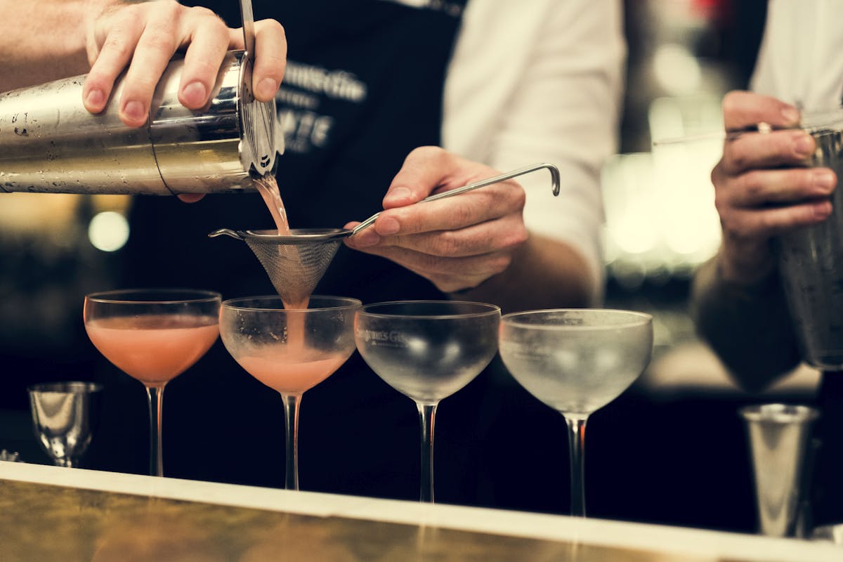 a person holding a wine glass