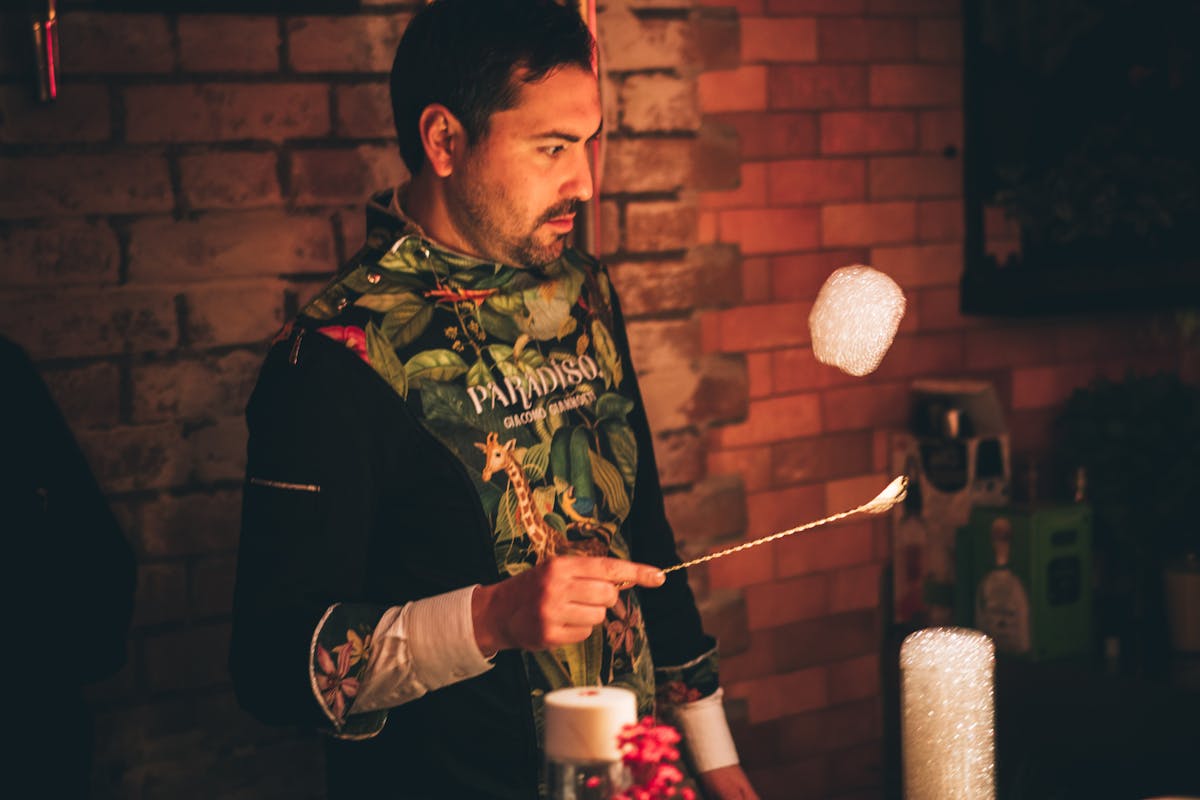 a man holding a wine glass