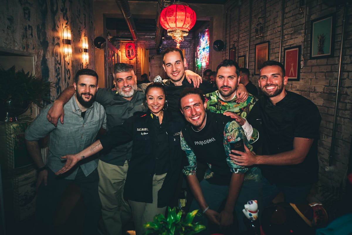 a group of people posing for a photo