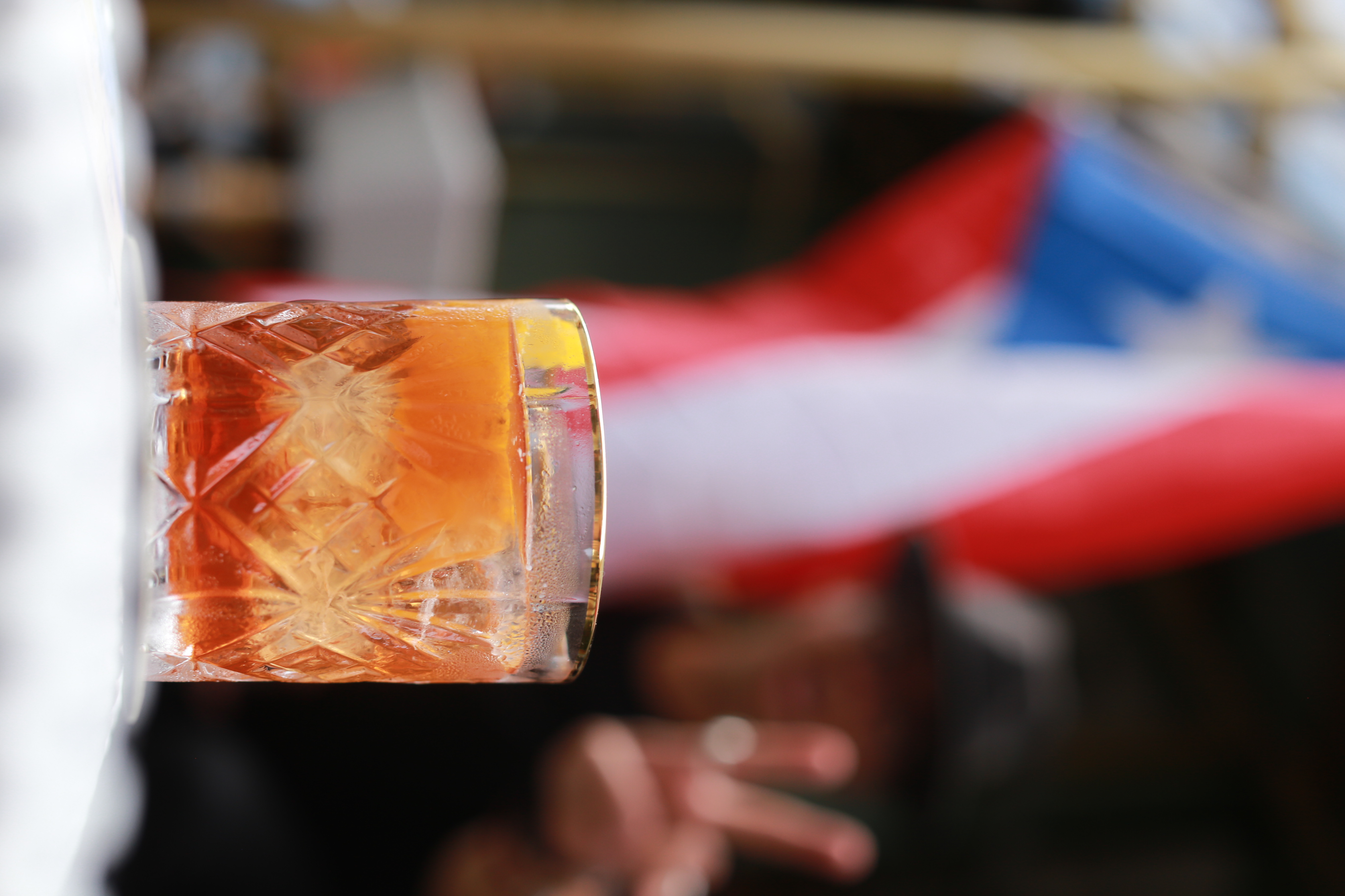 a close up of a glass cup on a table