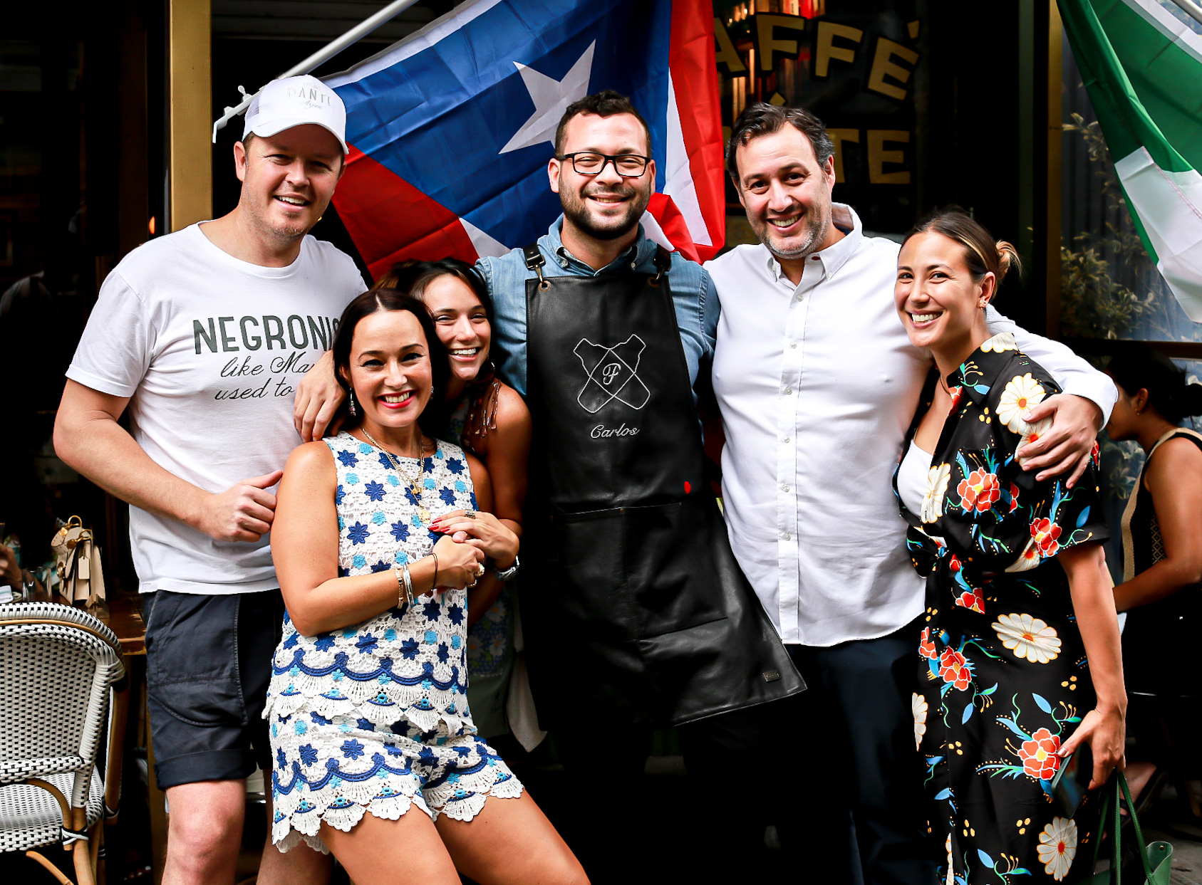 a group of people posing for the camera