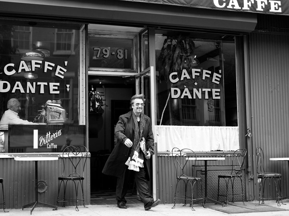 a person standing in front of a store