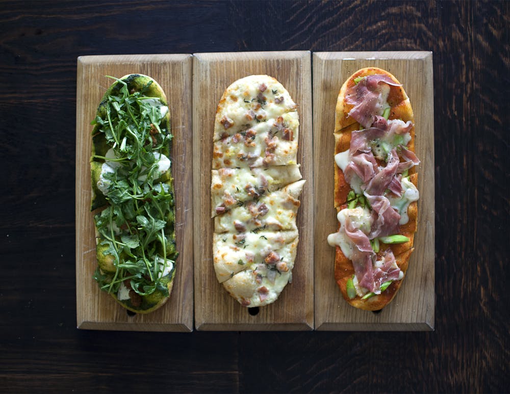 a box filled with different types of food on a wooden table