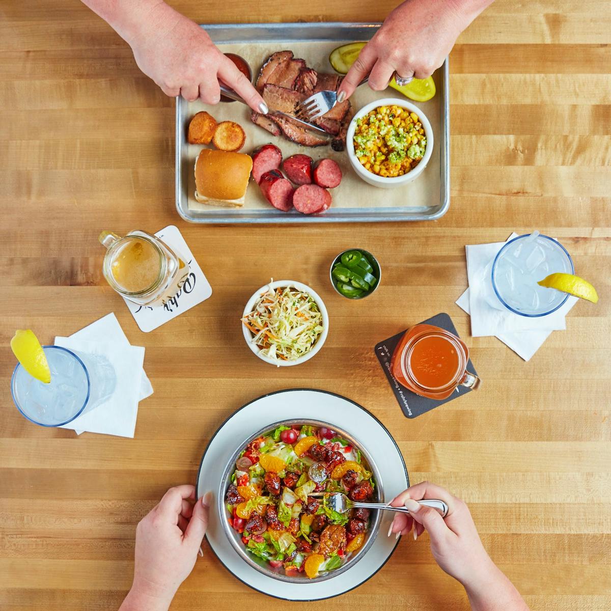 a person cutting food on a table