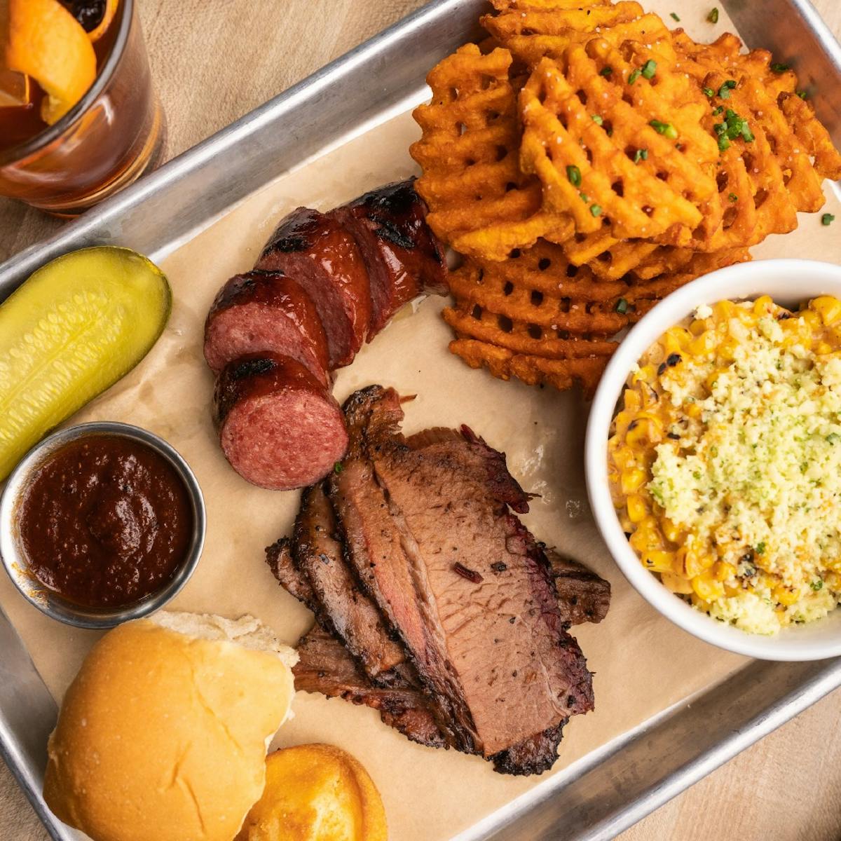 a box filled with different types of food on a plate