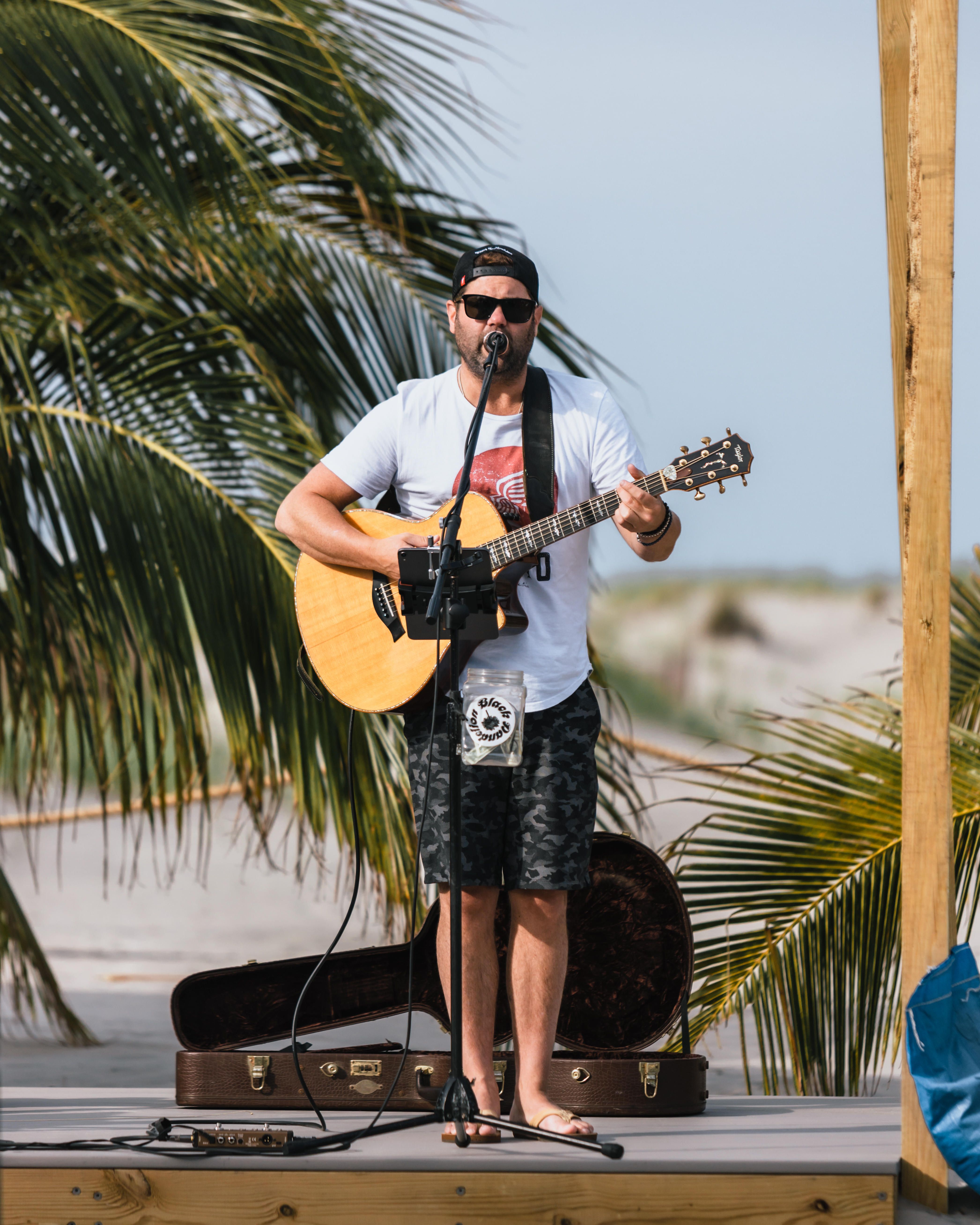a person holding a guitar