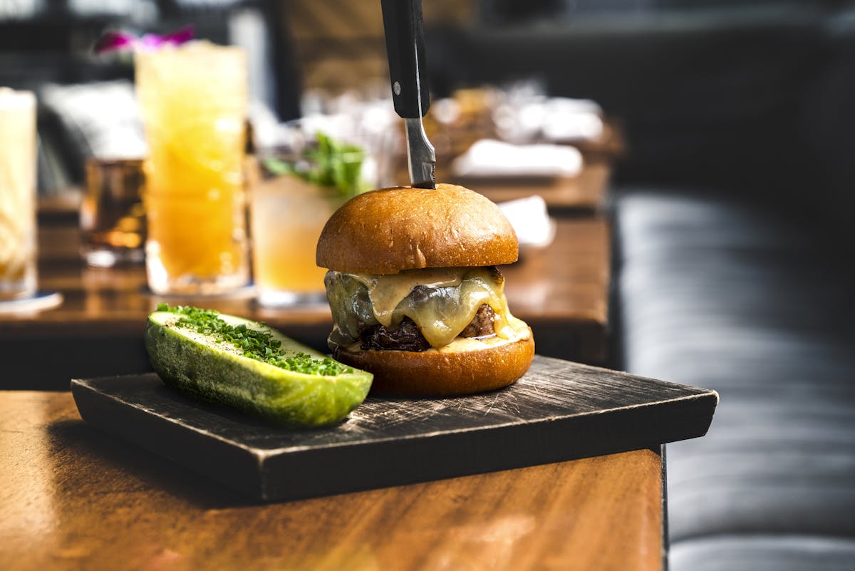 a hamburger on a tray