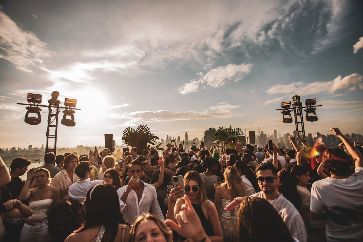 a group of people standing in front of a crowd