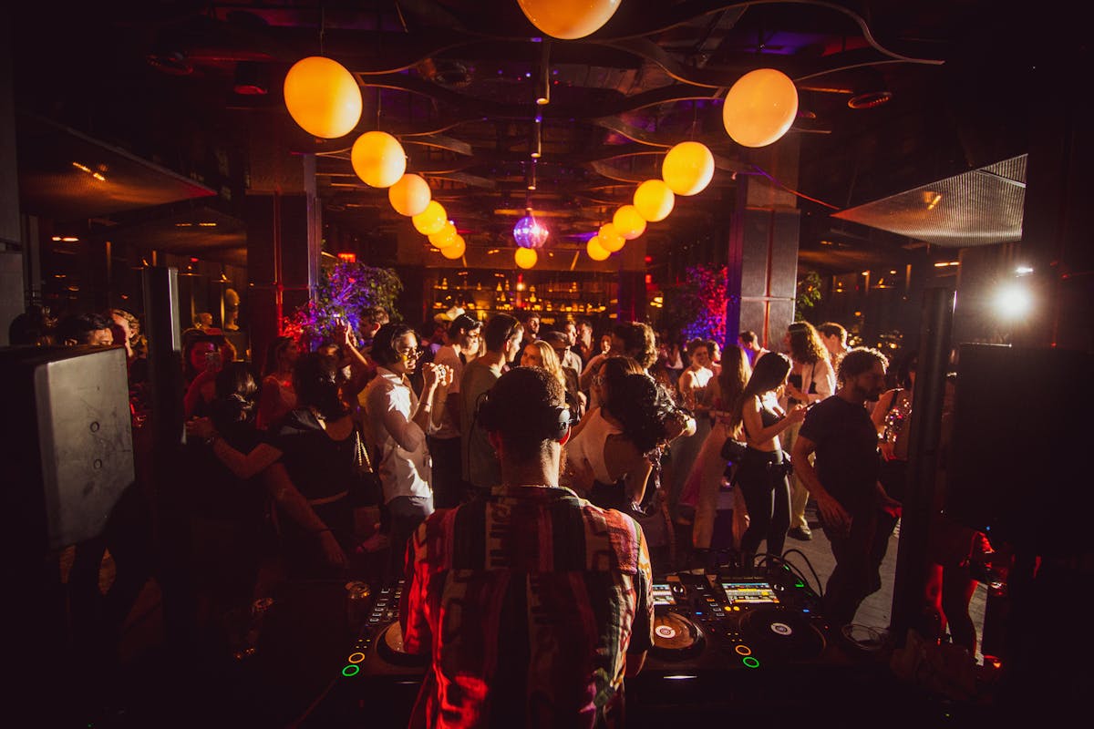 a group of people standing in front of a crowd