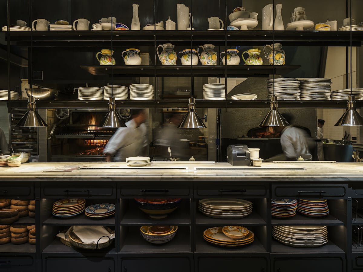 a kitchen with a stove top oven sitting inside of a store