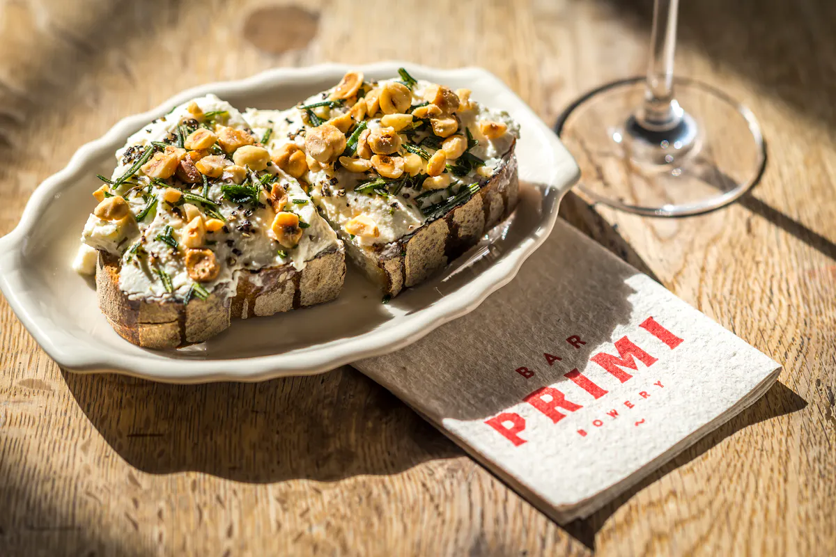 a plate of food sitting on top of a wooden table