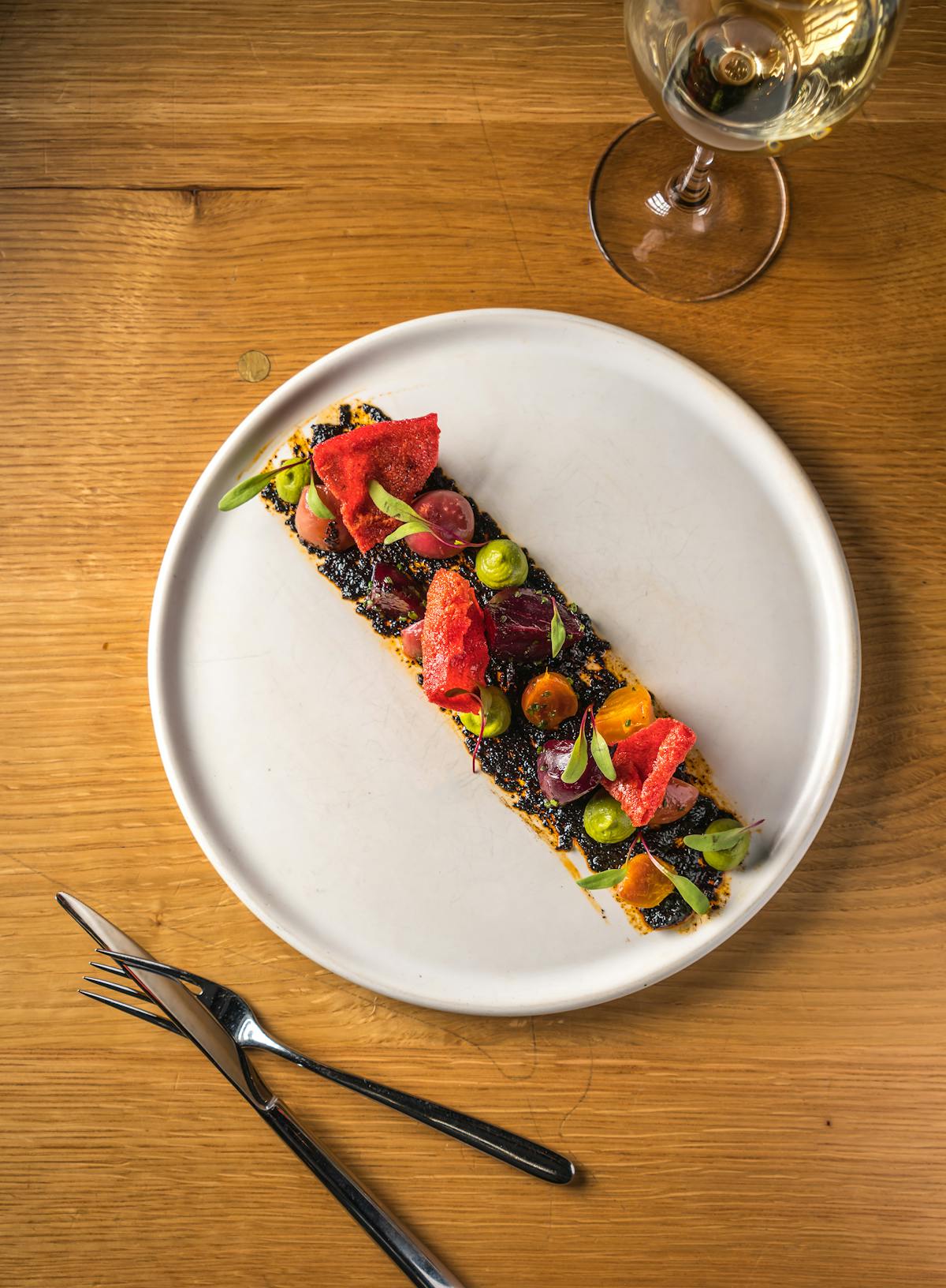 a bowl of food on a plate on a table