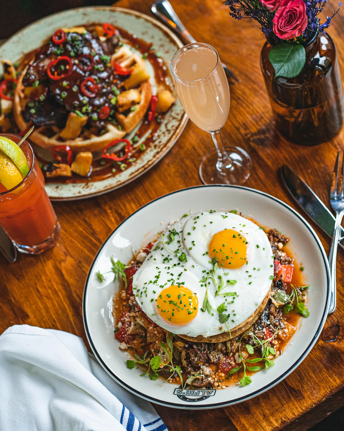a table topped with plates of food on a plate