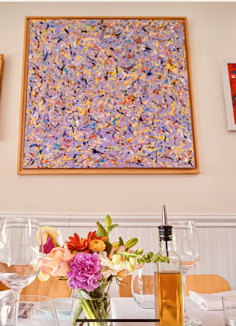 a vase of flowers on a table