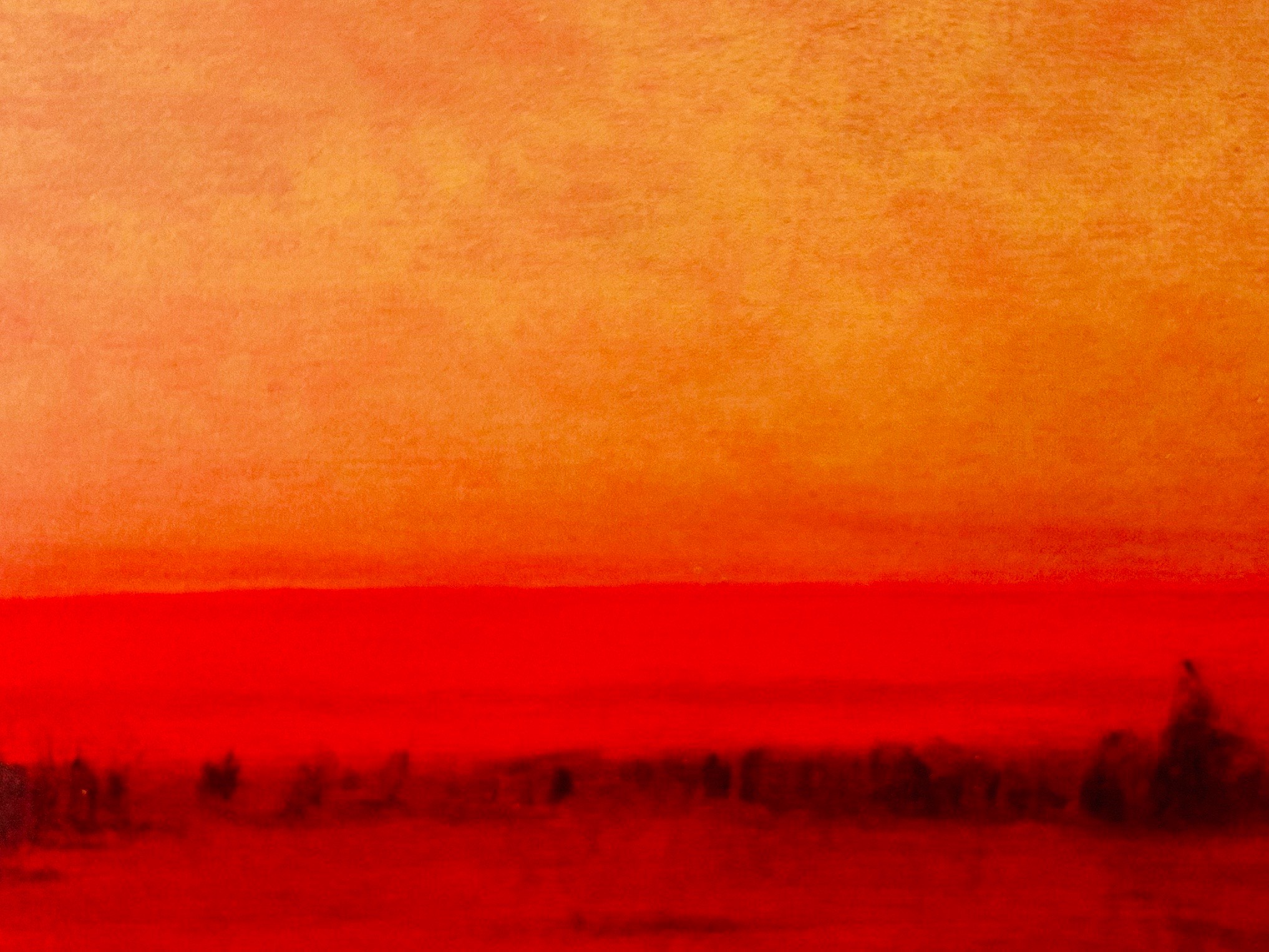 a sunset in the background