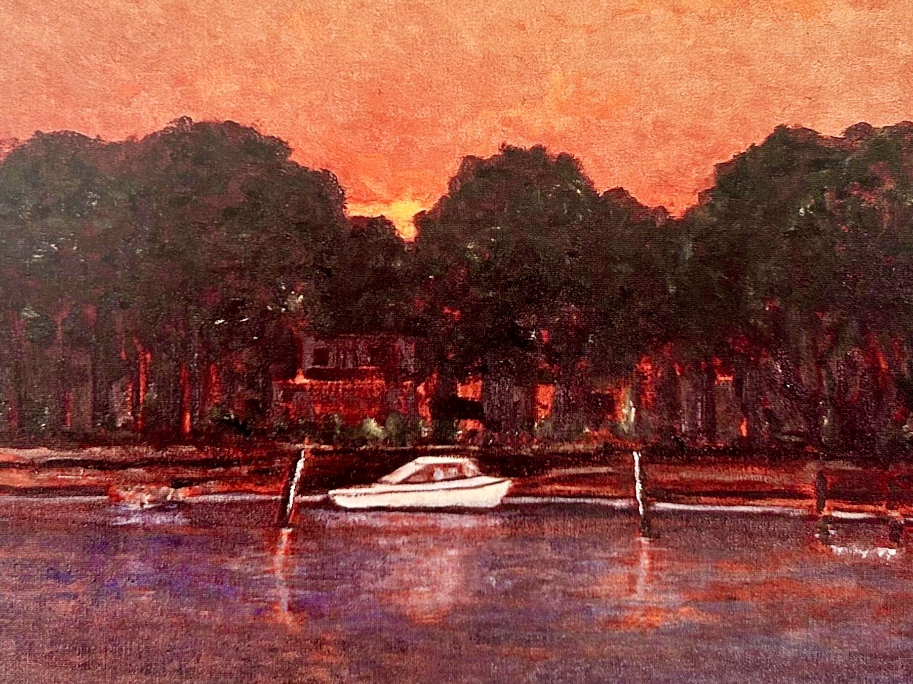 a body of water with a mountain in the background