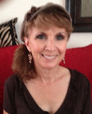 a woman smiling for the camera