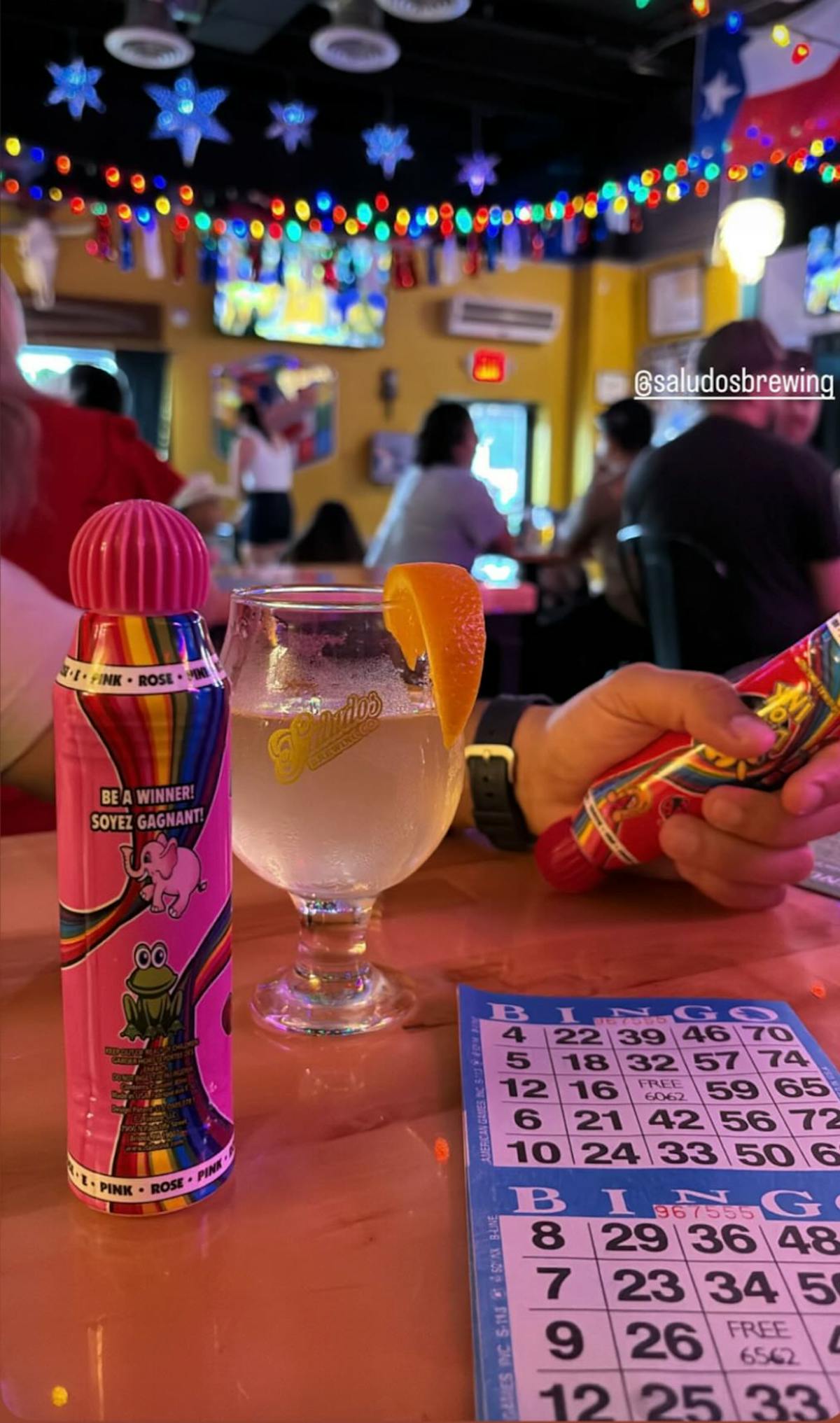 a bottle and a glass of beer on a table