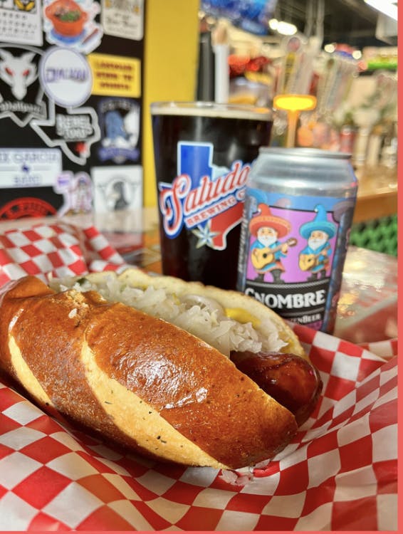 a close up of a hot dog on a bun