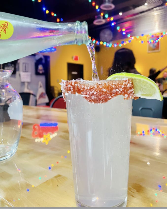 a group of glass bottles on a table