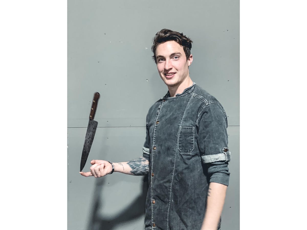 a man holding a gun