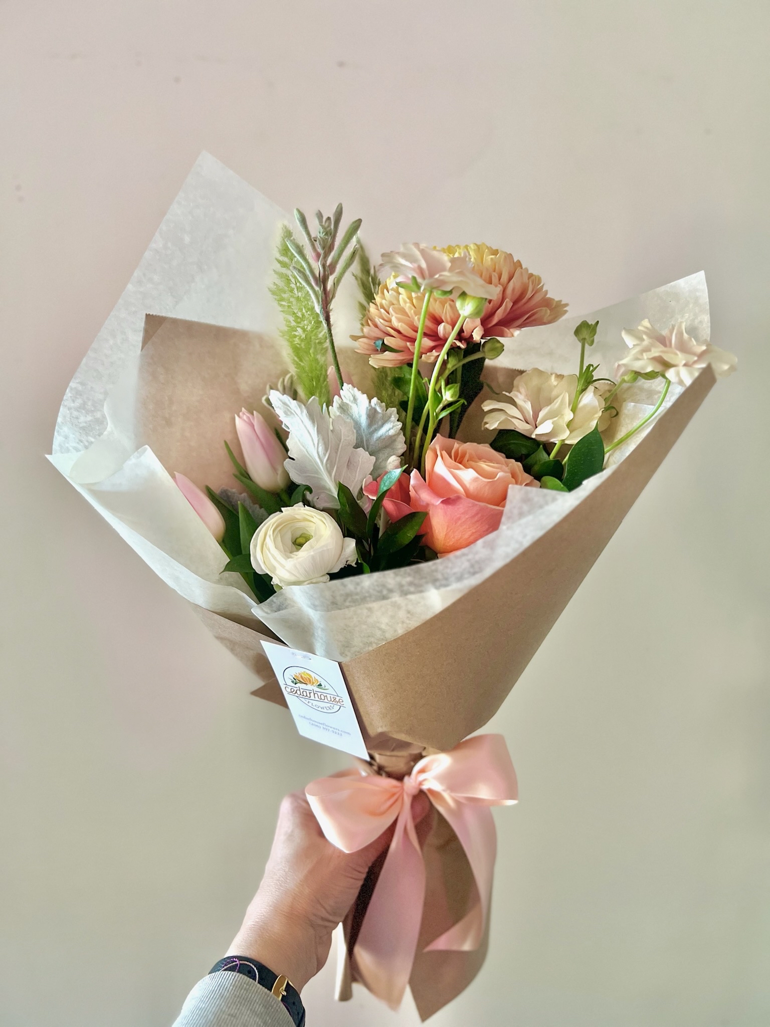 a vase filled with purple flowers