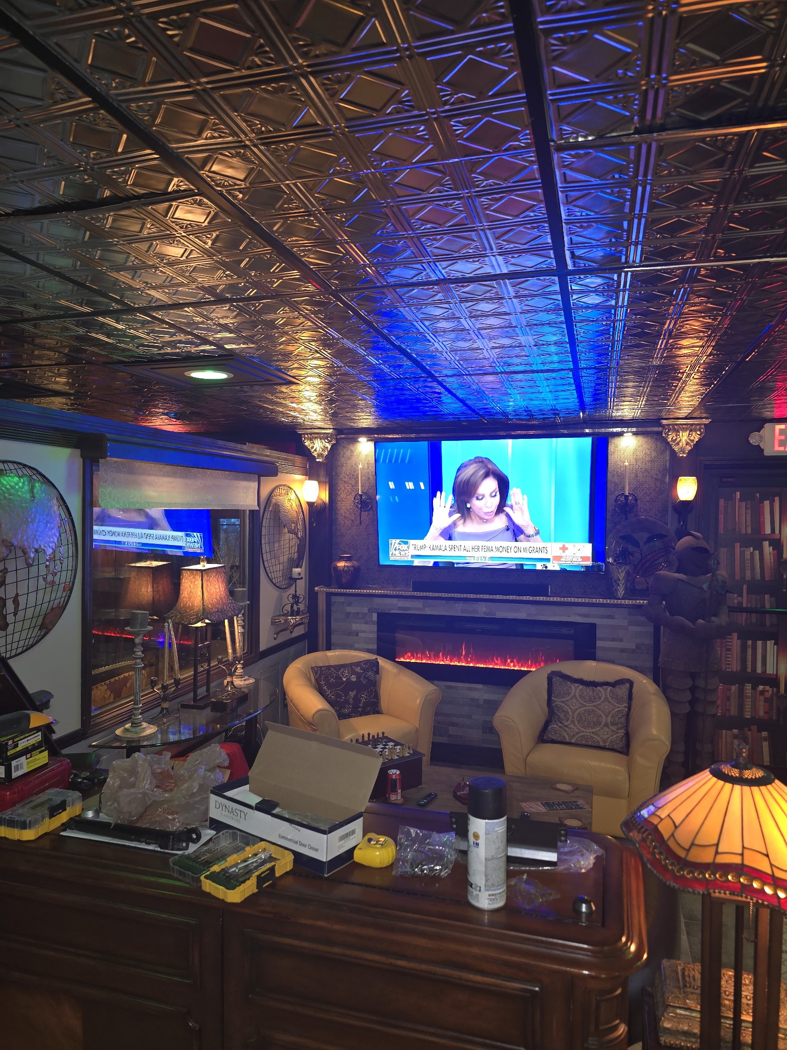 A cozy room featuring a television and a comfortable couch, ideal for relaxation and entertainment
