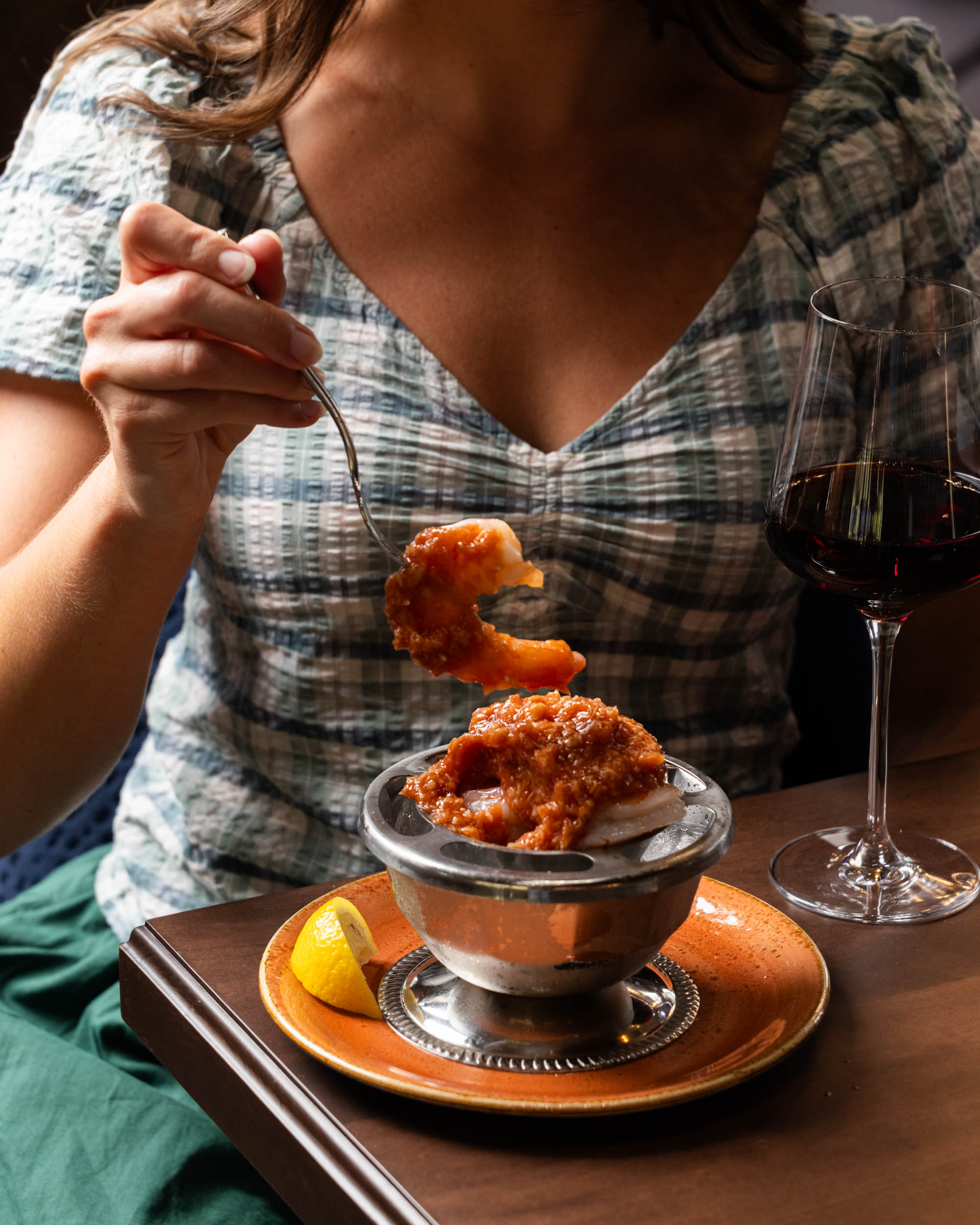 a woman eating food with a fork