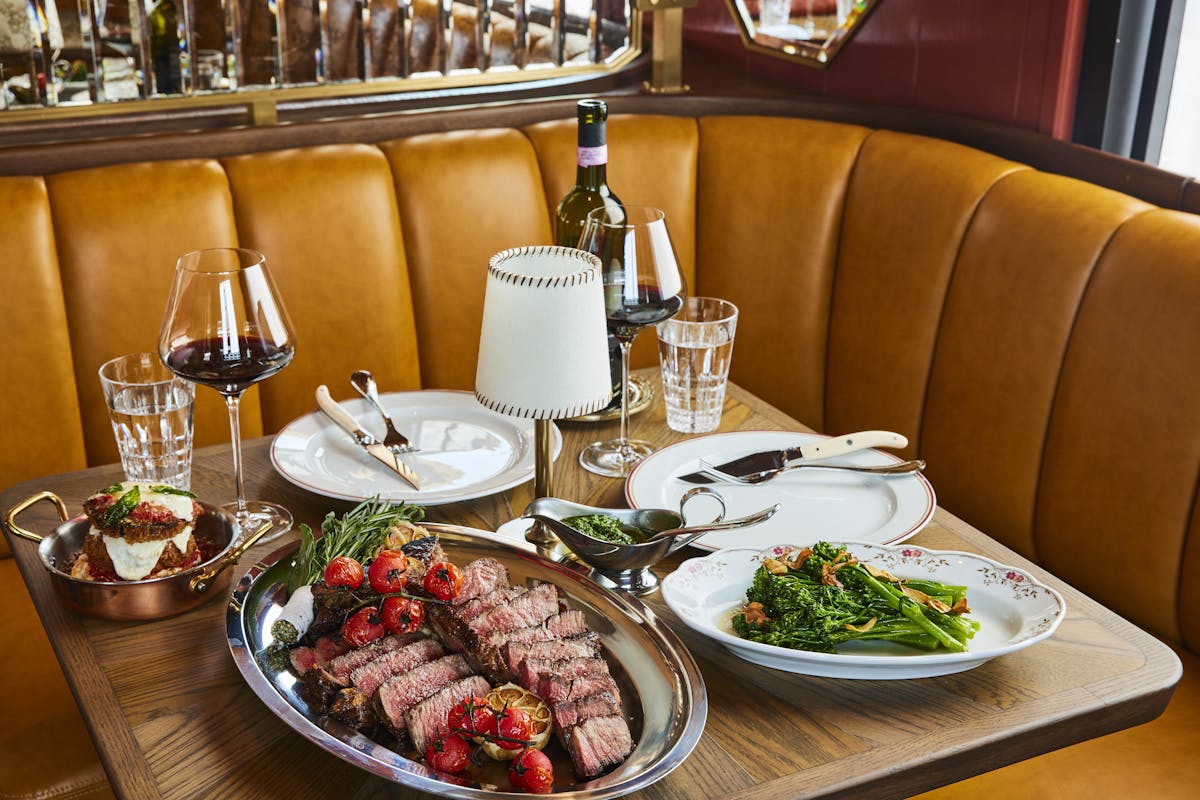 steak and vegetables on a table
