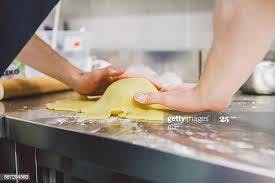 a person cooking in a kitchen