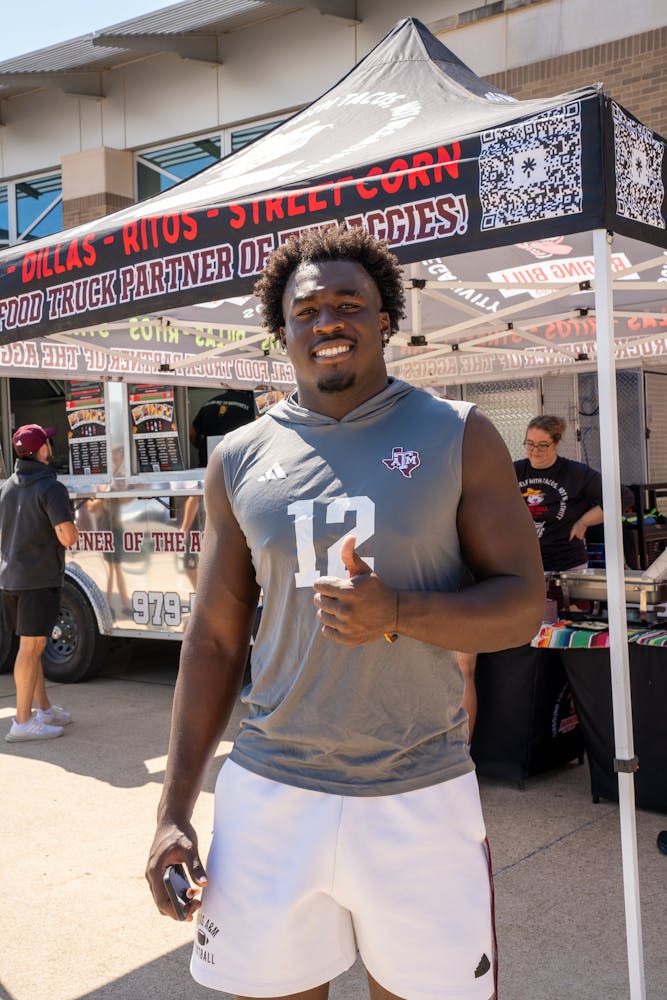 a man standing in front of a building