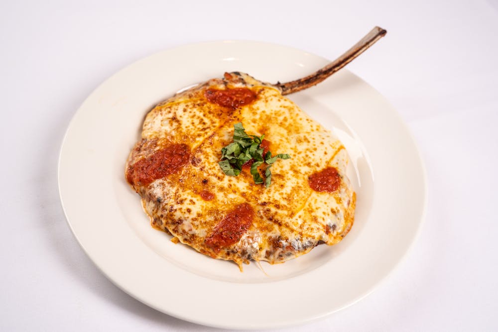 a slice of pizza on a plate