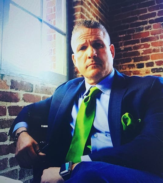 a man wearing a suit and tie