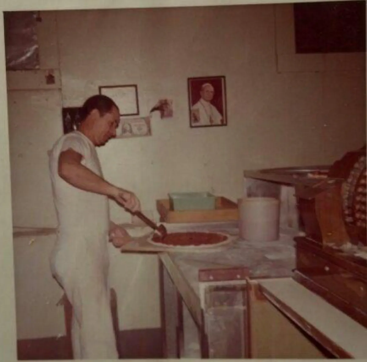a person cooking in a kitchen
