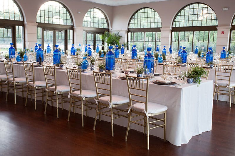 tables with chairs and plates