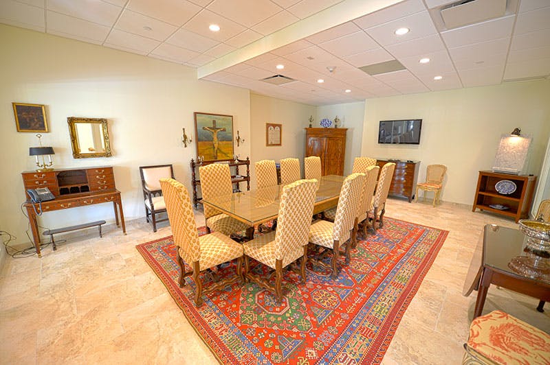 white table with decorative carpet